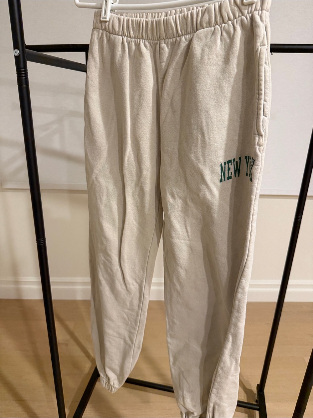 Brandy Melville Cream Joggers with Green "New York" Lettering